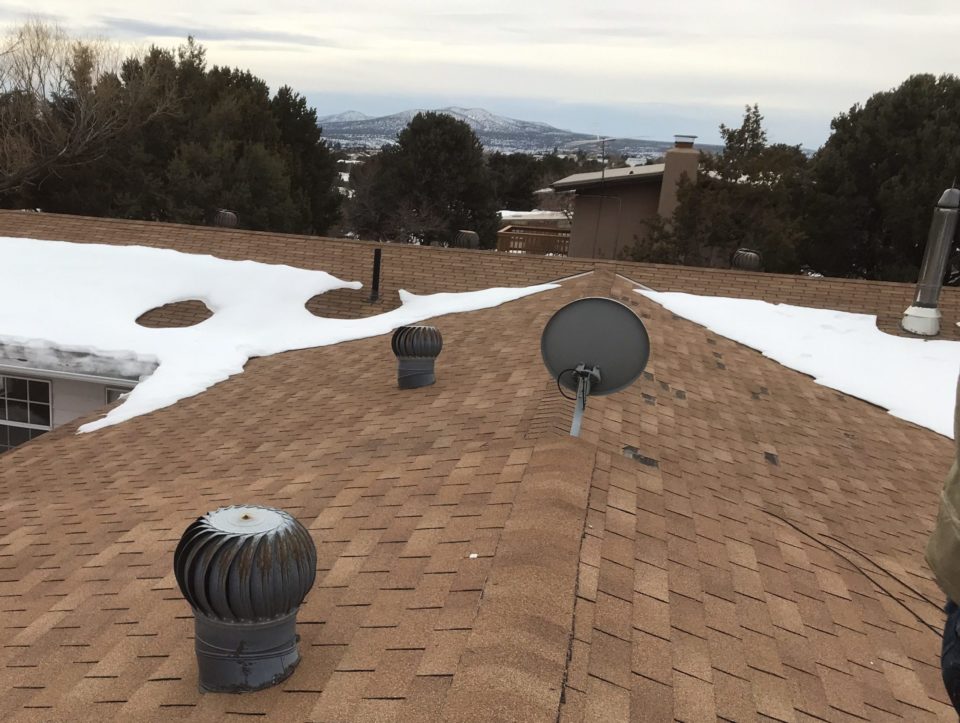Winter Damaged Shingle Roof